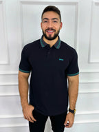 Camisa polo para hombre en negro con detalles en verde, estilo moderno y corte ajustado