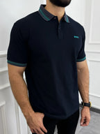 Camisa polo hombre negro con detalles turquesa, corte moderno y logo BOSS, ideal para estilo casual elegante