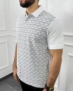 Camisa polo hombre blanco con estampado gráfico, corte moderno y tela premium para estilo urbano y elegante