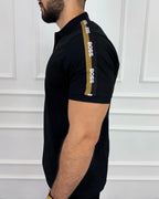 Camisa polo negra para hombre con detalles BOSS en manga, estilo moderno y corte ajustado