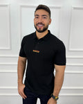 Camisa polo negra para hombre con logo HUGO en fuego, estilo moderno y calidad premium