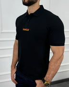 Camisa polo negra para hombre con logo HUGO en fuego, estilo moderno y calidad premium
