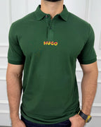 Camisa polo verde hombre con logo HUGO en llamas, estilo moderno y calidad premium